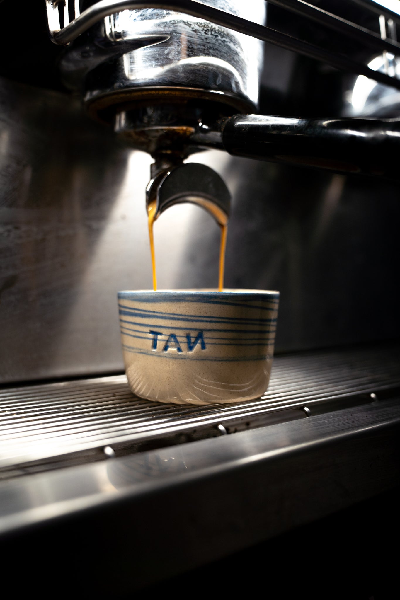 Taza TAN