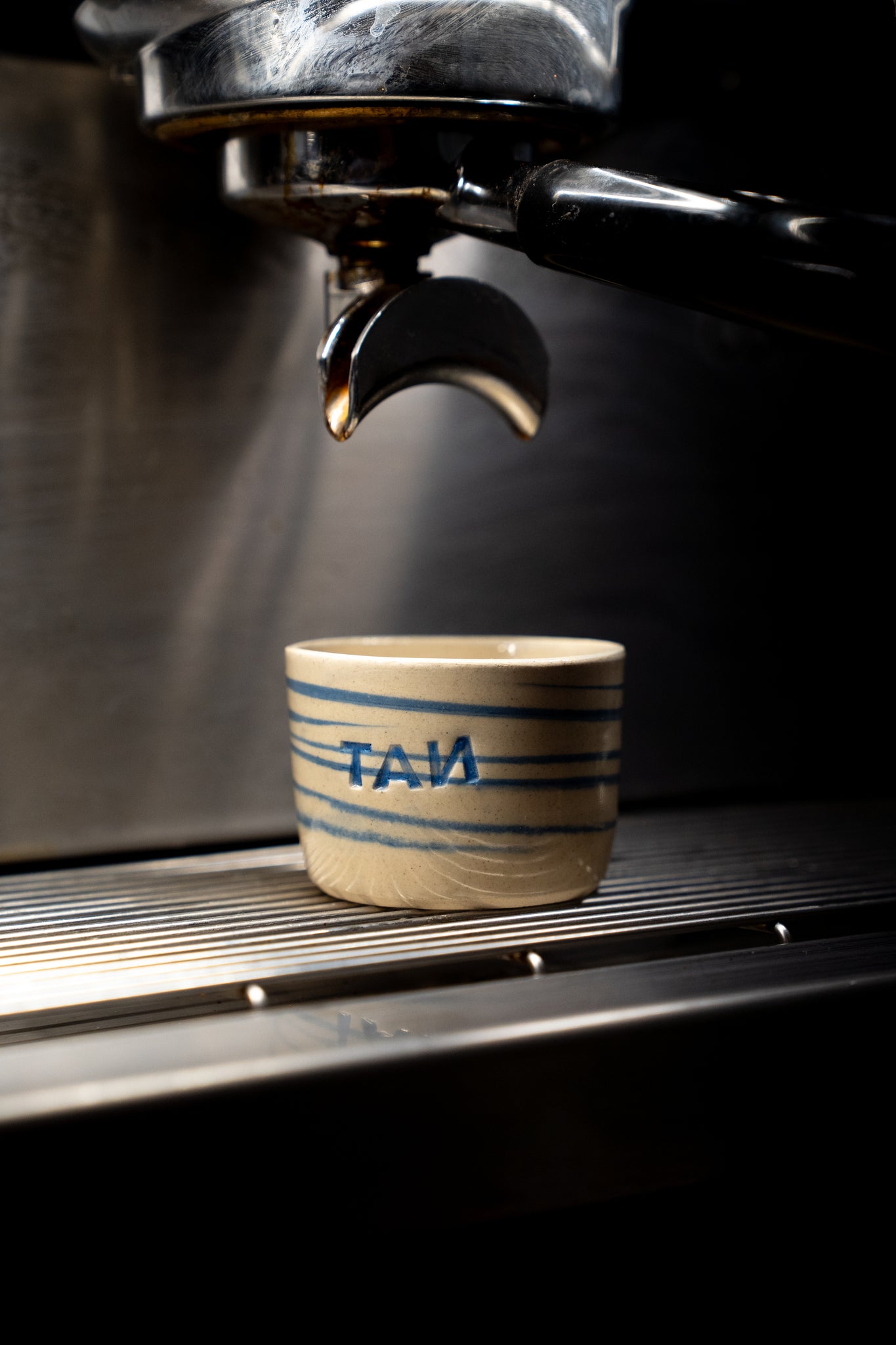 Taza TAN